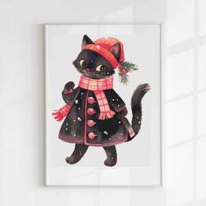 May include: A black cat wearing a red and white plaid scarf and a red hat with a sprig of holly. The cat is standing on a white background.
