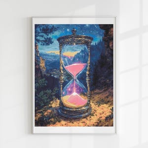 May include: Framed art print featuring an hourglass with pink sand, set against a mountain landscape and starry night sky. The hourglass has ornate gold and silver detailing, creating a surreal and dreamlike scene.