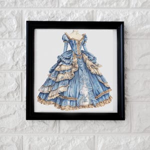 May include: A framed watercolor print of a blue and cream-colored ball gown. The dress features layered ruffles, intricate lace details, and gold trim. The artwork is displayed in a black frame, suitable for wall decor.