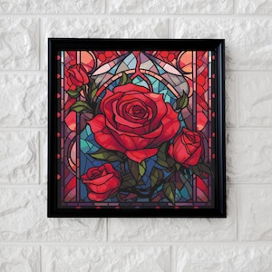 Puede incluir: Obra de arte enmarcada con un diseño de vidriera de rosas rojas. Las rosas son el foco central, sobre un fondo de azules, rojos y morados. El marco es negro.
