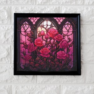 May include: A framed illustration of a stained glass window with a gothic arch design. The window is filled with pink roses and vines. The background is a sunset sky.