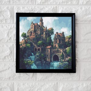 Könnte beinhalten: Gerahmter Kunstdruck einer Fantasy-Schloss-Szene. Das Kunstwerk zeigt ein mehrstöckiges Schloss mit Wasserfällen, üppigem Grün und blauem Himmel. Das Schloss ist in Braun-, Rot- und Grüntönen gehalten, vor einer weißen Backsteinmauer.