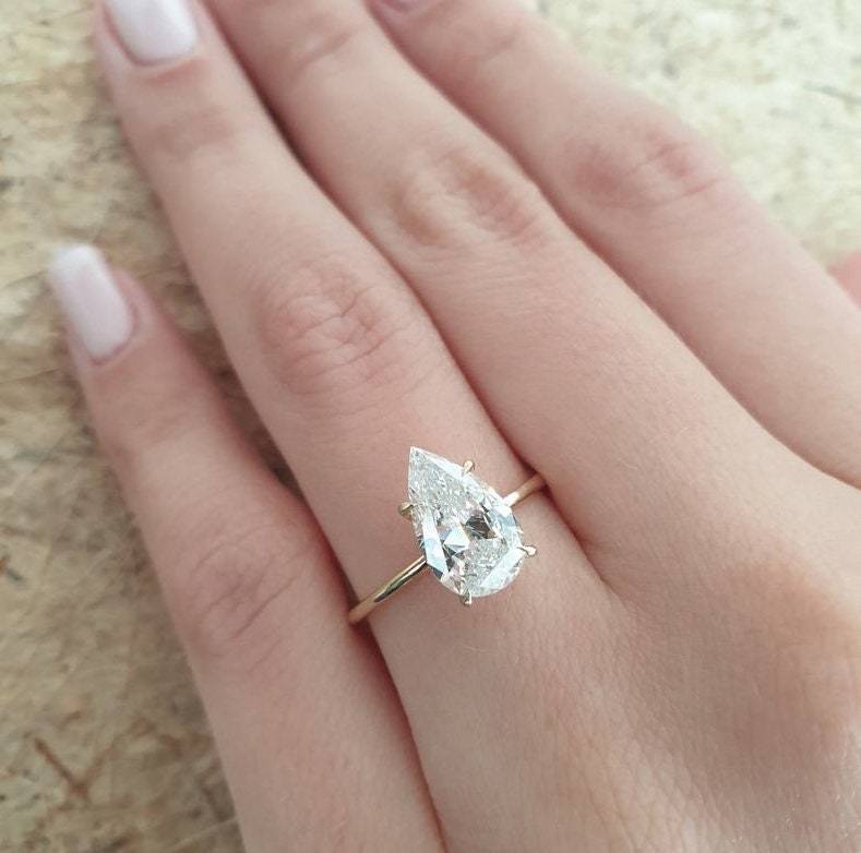Drop shaped diamond ring store