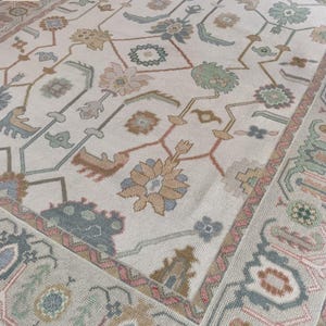 9x12 Vintage Oushak Rug: Hand-Knotted Wool Carpet with Pastel Floral Motifs