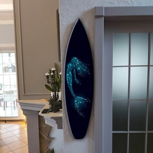 Surfboard wall art with mermaid