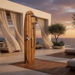May include: An outdoor shower unit featuring a vertical wooden panel shaped like a surfboard. The unit includes a circular overhead shower head, a handheld shower wand on a flexible hose, and two metallic control knobs mounted on the wood surface.