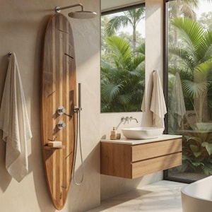 May include: A bathroom shower panel shaped like a surfboard made of vertical wood planks, featuring a round overhead shower head, a handheld shower wand, two circular control knobs, and a small integrated shelf holding a bar of soap.
