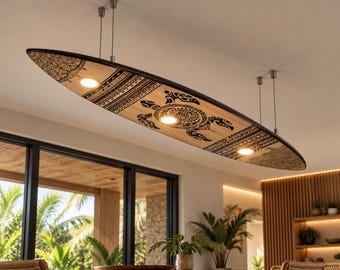 May include: A surfboard-shaped ceiling light fixture suspended by four thin metal cables. The light features a light wood finish with black tribal-style patterns, including a central sea turtle motif and three integrated circular LED lights.