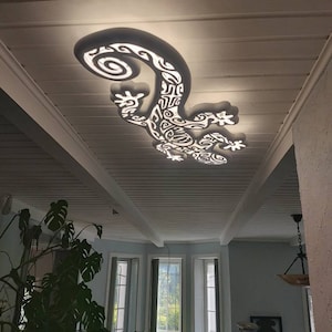 Handcrafted unique wooden gecon ceiling chandelier: led wall lamp for beach coastal or nautical home room decor in Maori surf style