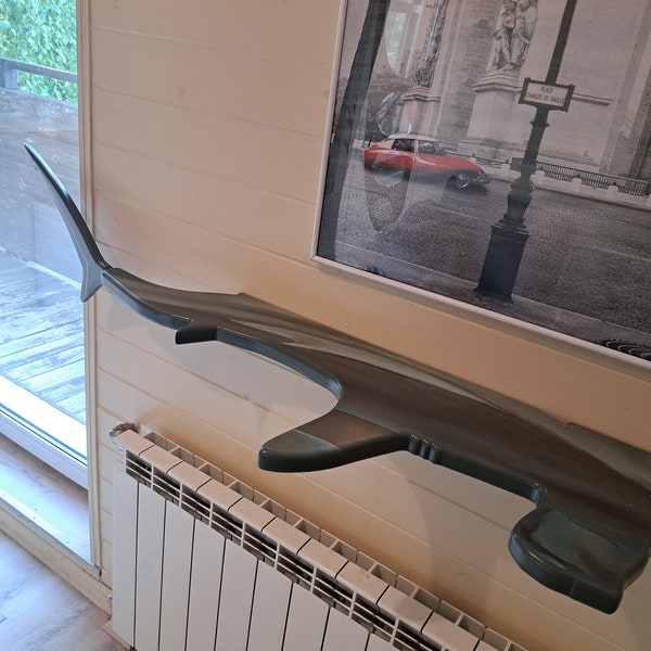 Shelf in the shape of a hammerhead shark for wall decoration