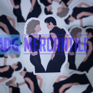 MOV6 Grease Youre The One That I Want Danny Zuko e Sandy Olsson adesivo IN LIQUIDAZIONE