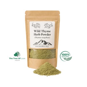 May include: A brown paper pouch containing Wild Thyme Herb Powder, labelled with the text Wild Thyme Herb Powder (Thymus serpyllum) and www.treeoflove.shop. A small pile of the fine, light green herbal powder sits in front of the pouch.