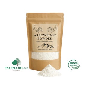 May include: A brown kraft paper pouch containing white arrowroot powder. The label reads ARROWROOT POWDER (Maranta arundinacea) with a mountain graphic and the website www.treeoflove.shop. A small pile of the white powder sits in front of the pouch.
