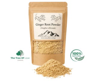 May include: A brown paper pouch containing light tan ginger root powder. The label features the text Ginger Root Powder, Zingiber officinale, a mountain illustration, and the website www.treeoflove.shop. A pile of the powder sits in front.