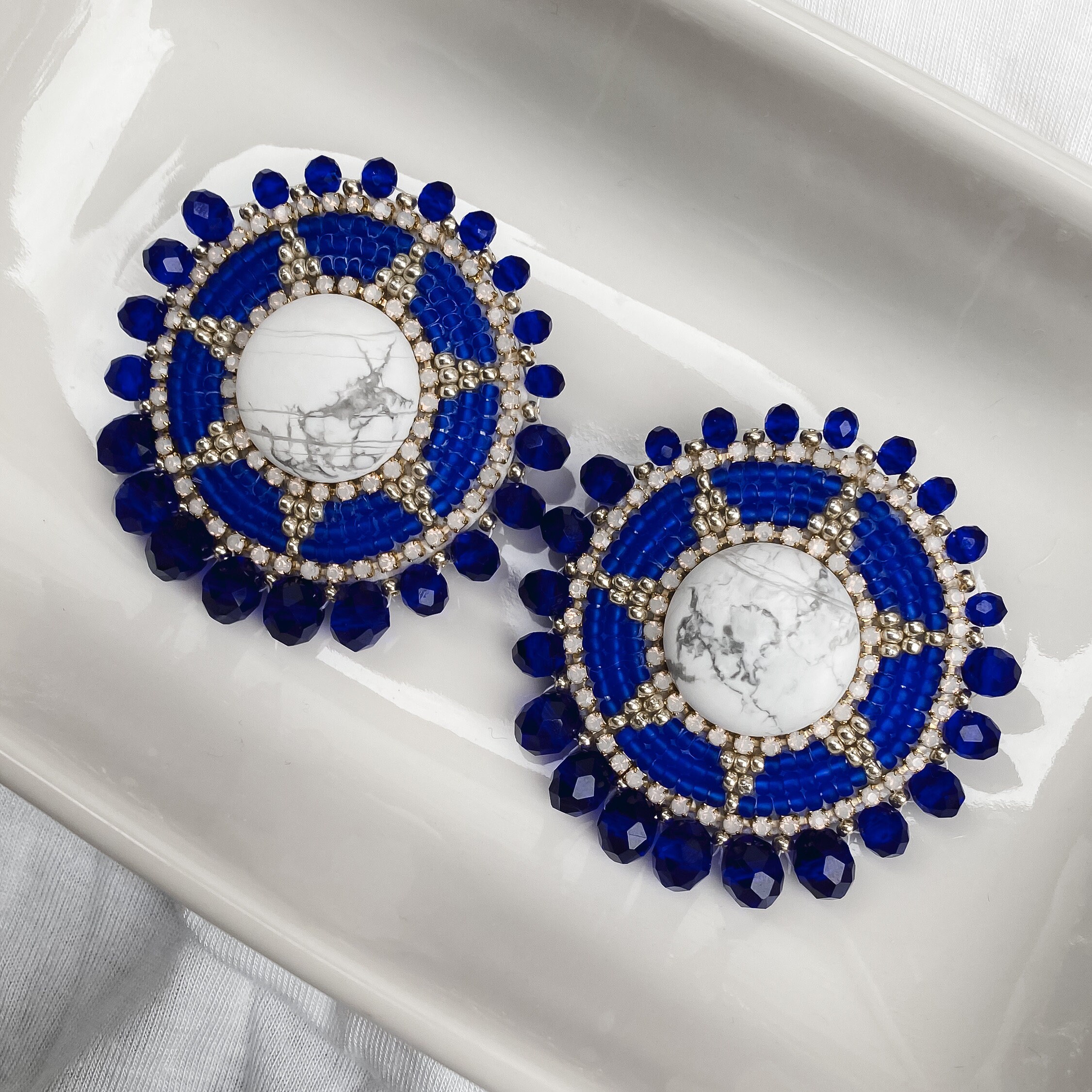 Blue heavy earrings discount