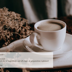 May include: A white coffee cup with a saucer, filled with coffee, on a white surface with a brown background. The text "What's inside?" is written in black on a white rectangle, with bullet points listing "Video tutorial", "PDF with list of ingredients and all stages of preparation explained in detail", and "Useful tips".