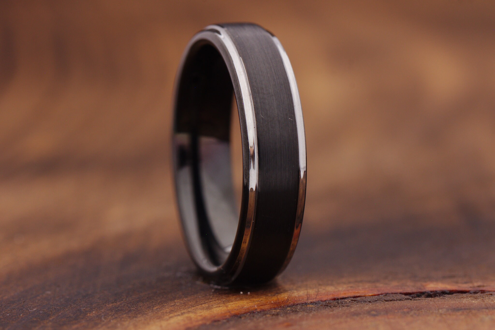 thumbnail interactive-video image 1 of Unbranded Men's Tungsten Carbide Wedding Band – Silver Brush With Black Edge, Size Q, No Stone 1 of 5