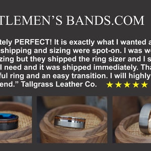 May include: Three close-up images of men's wedding bands with wood inlay. The first band is black with blue and wood inlay. The second band is silver with wood inlay. The third band is gray with wood inlay. "Absolutely PERFECT! It is exactly what I wanted and the service, shipping and sizing were spot-on. I was worried about sizing but they shipped the ring sizer and I selected the size I need and it was shipped immediately. Thanks for a beautiful ring and an easy transition. I will highly recommend." Tallgrass Leather Co.