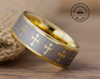 May include: A gold and grey tungsten carbide ring with a cross pattern design. The ring is engraved with the words "Gentlemen's Bands Est. 2019".