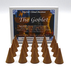 May include: A box of 20 brown incense cones labeled "The Goblet" with the ingredients listed on the box. The box is white with blue and gold accents. Nectar Cloud Incense.