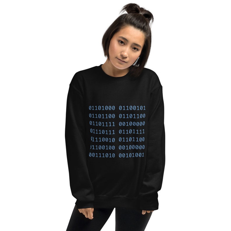 May include: Black sweatshirt with a pattern of blue binary code printed on the front. The code reads: 01101000 01100101 01101100 01101100 01101111 00100000 01110111 01101111 (1110010 01101100 1100100 00100000 00111010 00101001