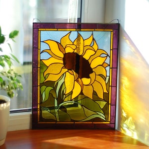 Medium stained glass square sun catcher with brazilian agate and filled with stained glass.