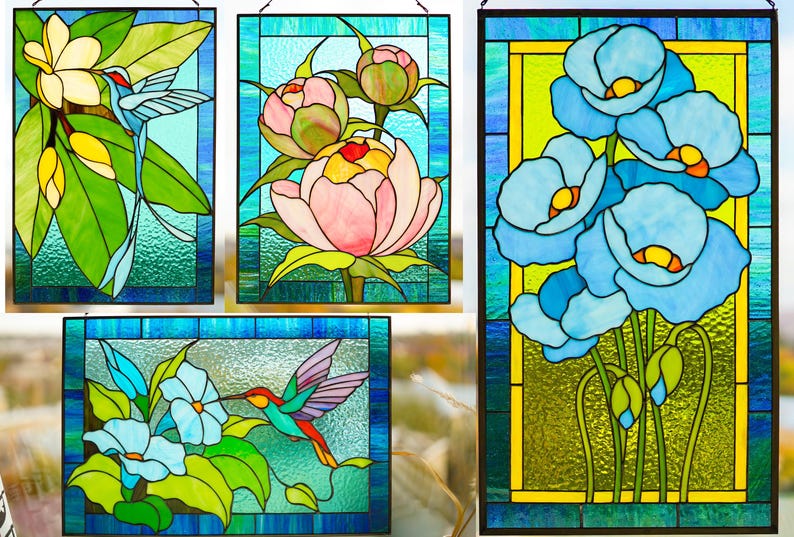 May include: A collection of stained glass panels featuring floral and hummingbird designs. The panels showcase vibrant colors, including blue, green, pink, and yellow. Each panel has a dark blue border and a textured glass background.