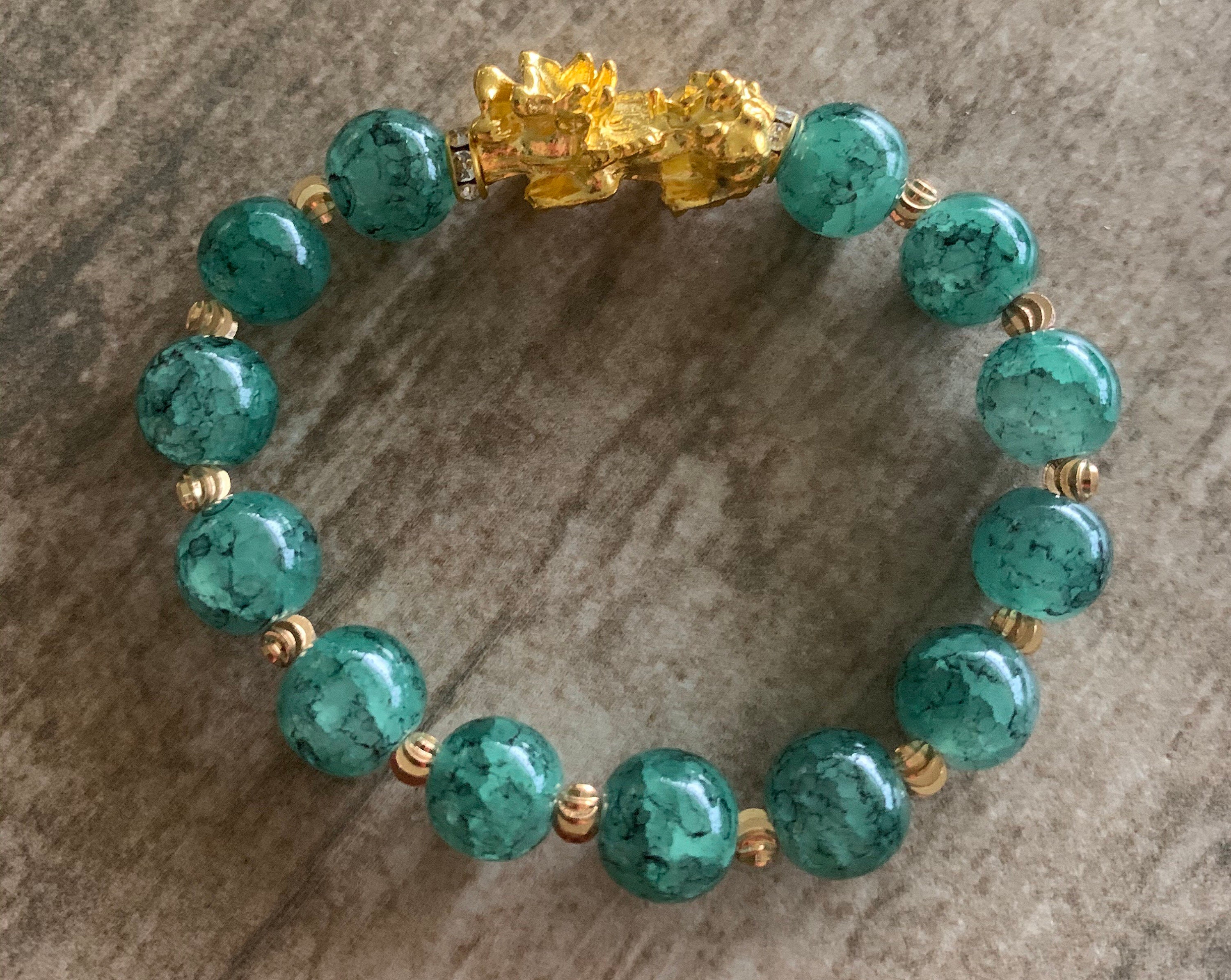 Obsidian Chakra Bracelet With Feng Shui Good Green Luck Wealth Gold Jade  Bead Bracelet 8 12mm Womens Wristband With Pixiu Charms Uni K1G2200a From  Lnbbf, $29.99 | DHgate.Com