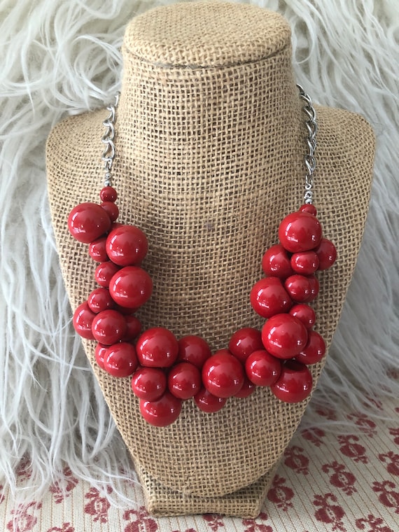 Red bib necklace deals