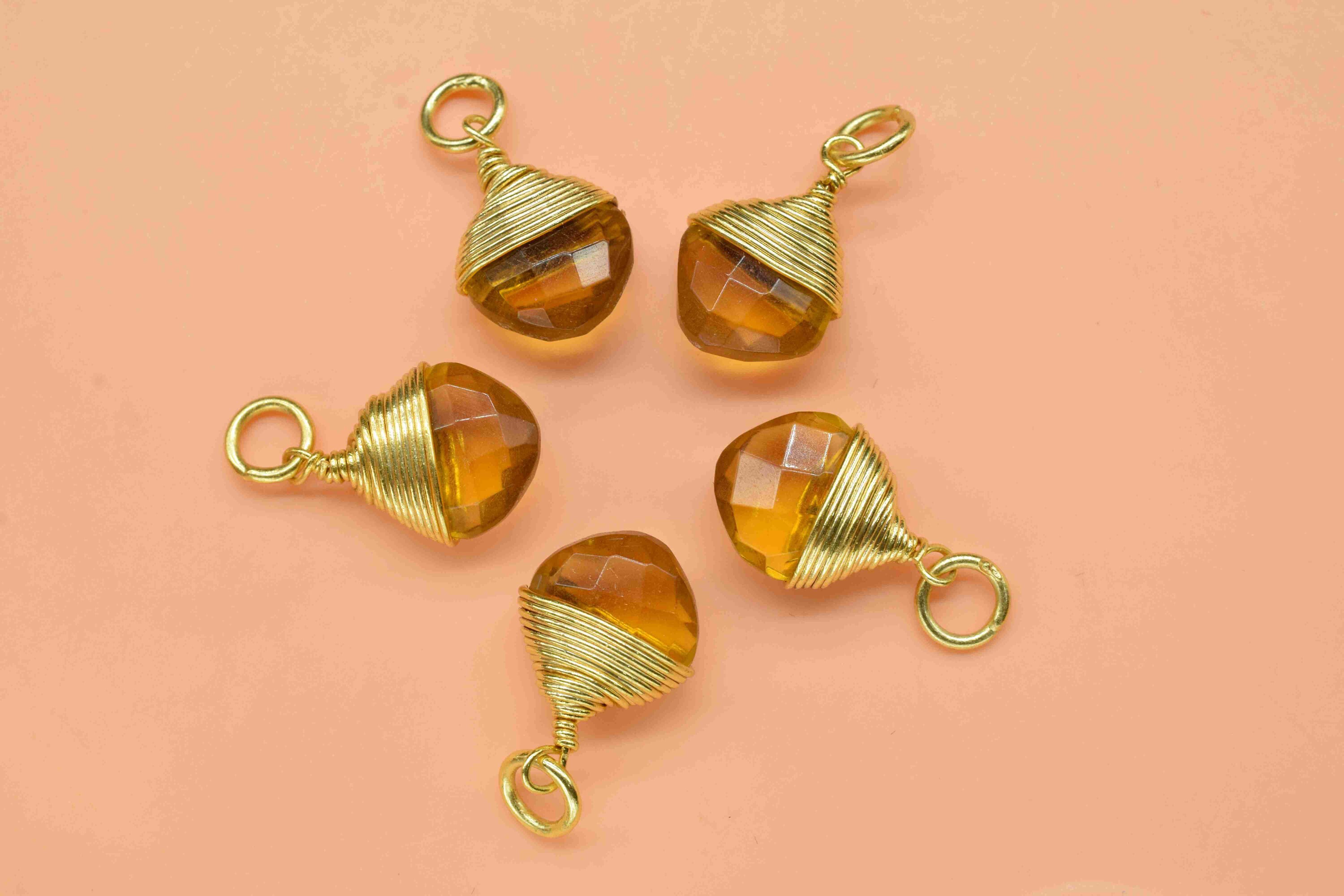 Citrine Madère Synthétique – Briolette Facettée 21,37 Carats – Transparent Orange
