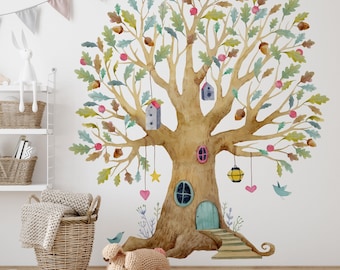 May include: Watercolor wall decal of a whimsical tree with a treehouse design. The tree features a brown trunk, green and brown leaves, acorns, and small birdhouses. Decorative elements include hanging hearts, stars, and a lantern.