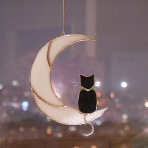 Hanging Suncatcher Black Cat On Moon stained glass window is a unique handmade decor, idea for anniversary, birthday and Christmas gift for an animal lover. This cute miniature art can decorate your home and garden outdoor decor, pet loss memorial.