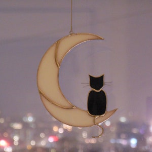 Hanging Suncatcher Black Cat On Moon stained glass window is a unique handmade decor, idea for anniversary, birthday and Christmas gift for an animal lover. This cute miniature art can decorate your home and garden outdoor decor, pet loss memorial.