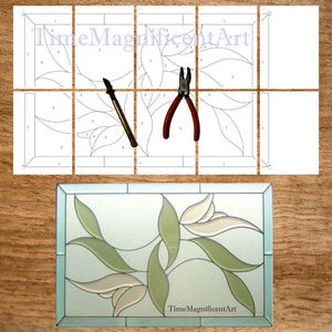 May include: A stained glass floral design with green and cream-coloured leaves is shown. The image includes a pattern, a pencil, and red-handled pliers. The text "TimeMagnificentArt" is visible on the glass.