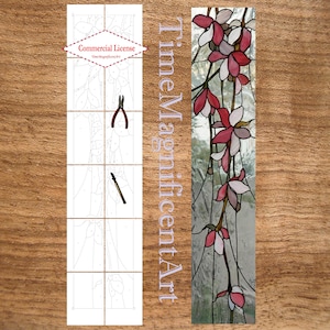May include: A stained glass panel with a floral design of pink and white flowers and green leaves. The panel is long and narrow, with a clear background. The text "TimeMagnificentArt" is on the right side. The left side shows a paint-by-number design.