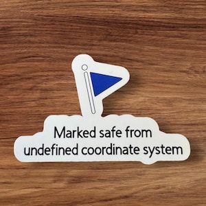 May include: White sticker with a blue flag icon and the text "Marked safe from undefined coordinate system".