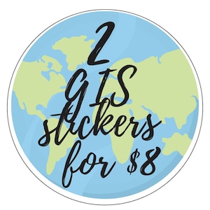 May include: A round sticker featuring a world map design in blue and green. The text "2 GTS stickers for $8" is written in a black, handwritten style font, centered on the image.