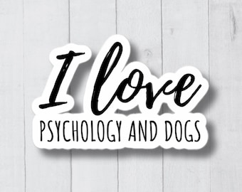 Może przedstawiać: Biała naklejka z czarnym tekstem, który brzmi "Kocham psychologię i psy".