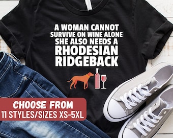Funny Rhodesian Ridgeback Shirt, Ridgeback Lover Gift, A Woman Cannot Survive On Wine Alone She Also Needs A Rhodesian Ridgeback T-Shirt