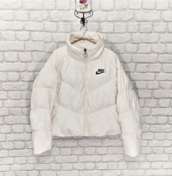 cream nike puffer