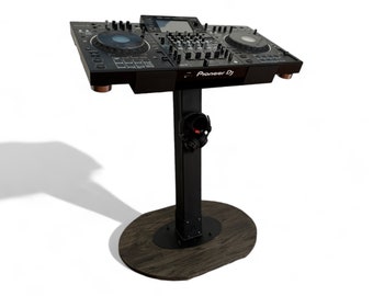 May include: Black DJ mixer on a black stand with a wooden base. The mixer has two large knobs and a screen. The stand has a headphone holder. The text "Pioneer DJ" is visible on the mixer.