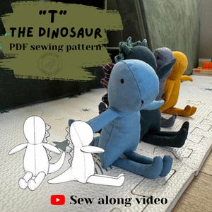 May include: A PDF sewing pattern for a dinosaur plush toy titled T The Dinosaur. The image displays three fabric dinosaur dolls in blue, dark green, and yellow, alongside two black and white line art sketches of the dinosaur design.