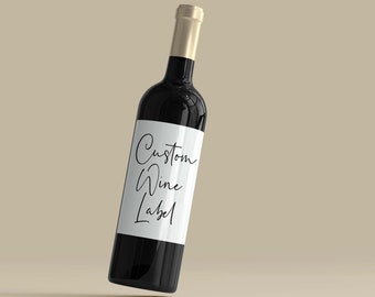 May include: A black wine bottle with a gold top and a white label that says "Custom Wine Label".