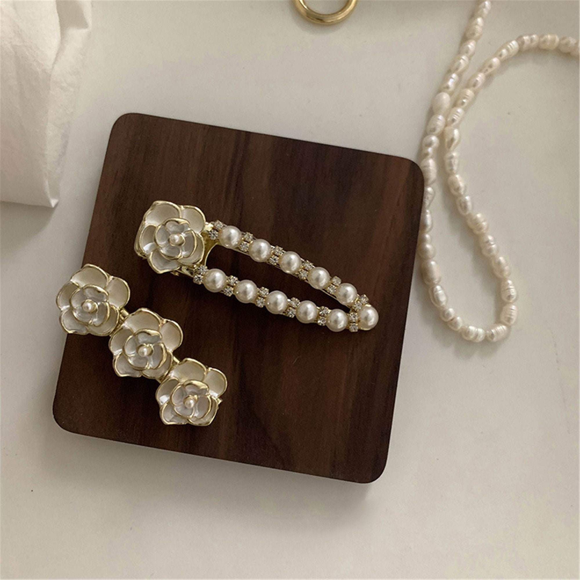 Shop CHANEL 2023-24FW Camellia Barrette (AA9627 B14811 94305, AA9627 B14811  10601) by ☆MI'sshop