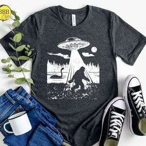 Funny Bigfoot UFO Abduction Shirt: Sasquatch, Loch Ness Monster Tee