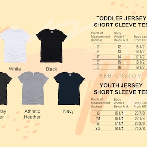 May include: A size chart for toddler and youth jersey short sleeve t-shirts. The chart shows the body width and length measurements in inches for different sizes. The chart is displayed against a background of six t-shirts in different colors: white, black, dark gray heather, athletic heather, navy, and a light gray heather.