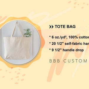 May include: A beige tote bag with self-fabric handles hangs against a white wall. The bag is made of 100% cotton and has a 9 1/2 inch handle drop. Text on the image reads "TOTE BAG" and "BBB CUSTOM".