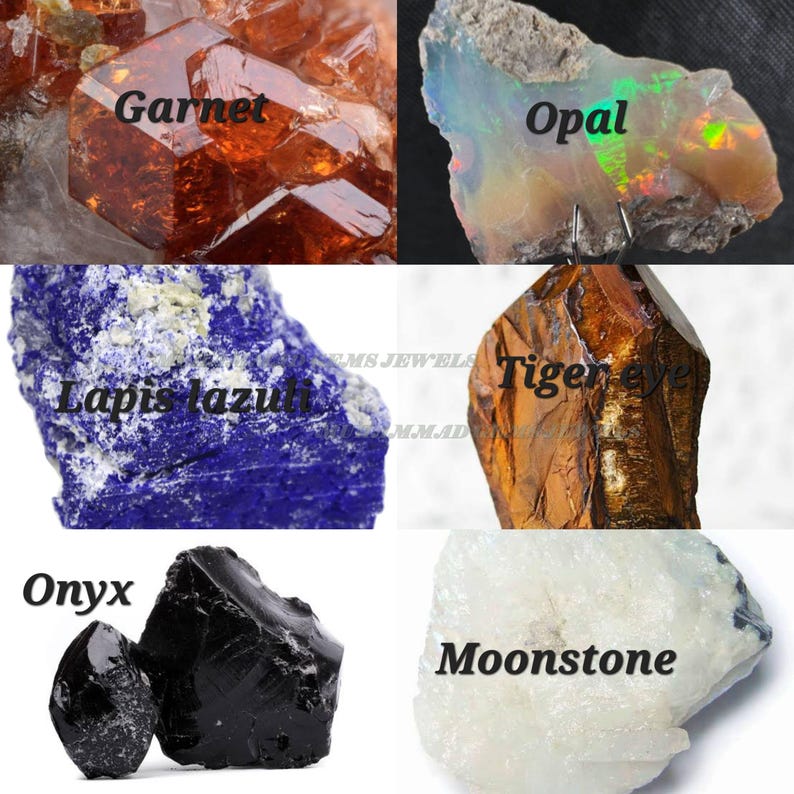 May include: A collection of raw gemstones, including garnet, opal, lapis lazuli, tiger eye, onyx, and moonstone. The garnet is a deep red, the opal has iridescent colors, and the onyx is black. Each stone is labeled with its name.