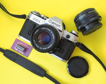 Cámara réflex Canon AE-1 de 35 mm + Batería + Objetivo de 50 mm FUNCIONANDO