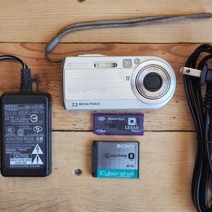 Sony Cyber-shot DSC-P150 7.2MP Compact Digital Point and Sony Cyber-shot DSC-P150 7.2MP Compact Digital Point and